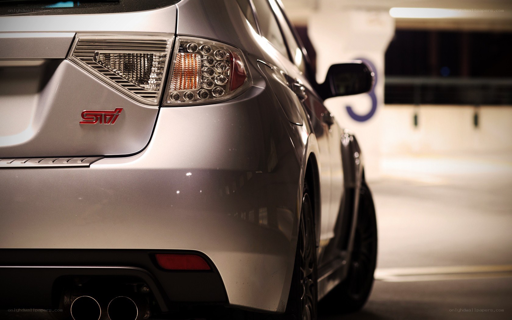 silver subaru sti rear view