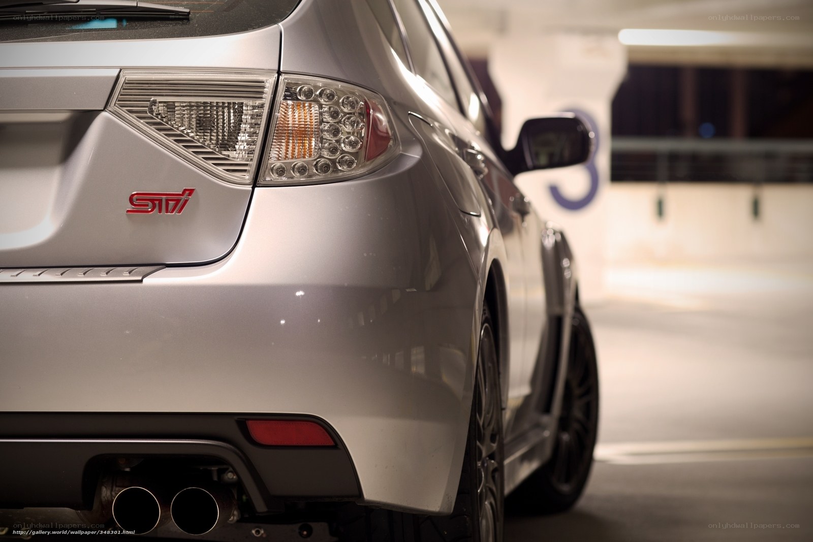 Silver Subaru STI rear view