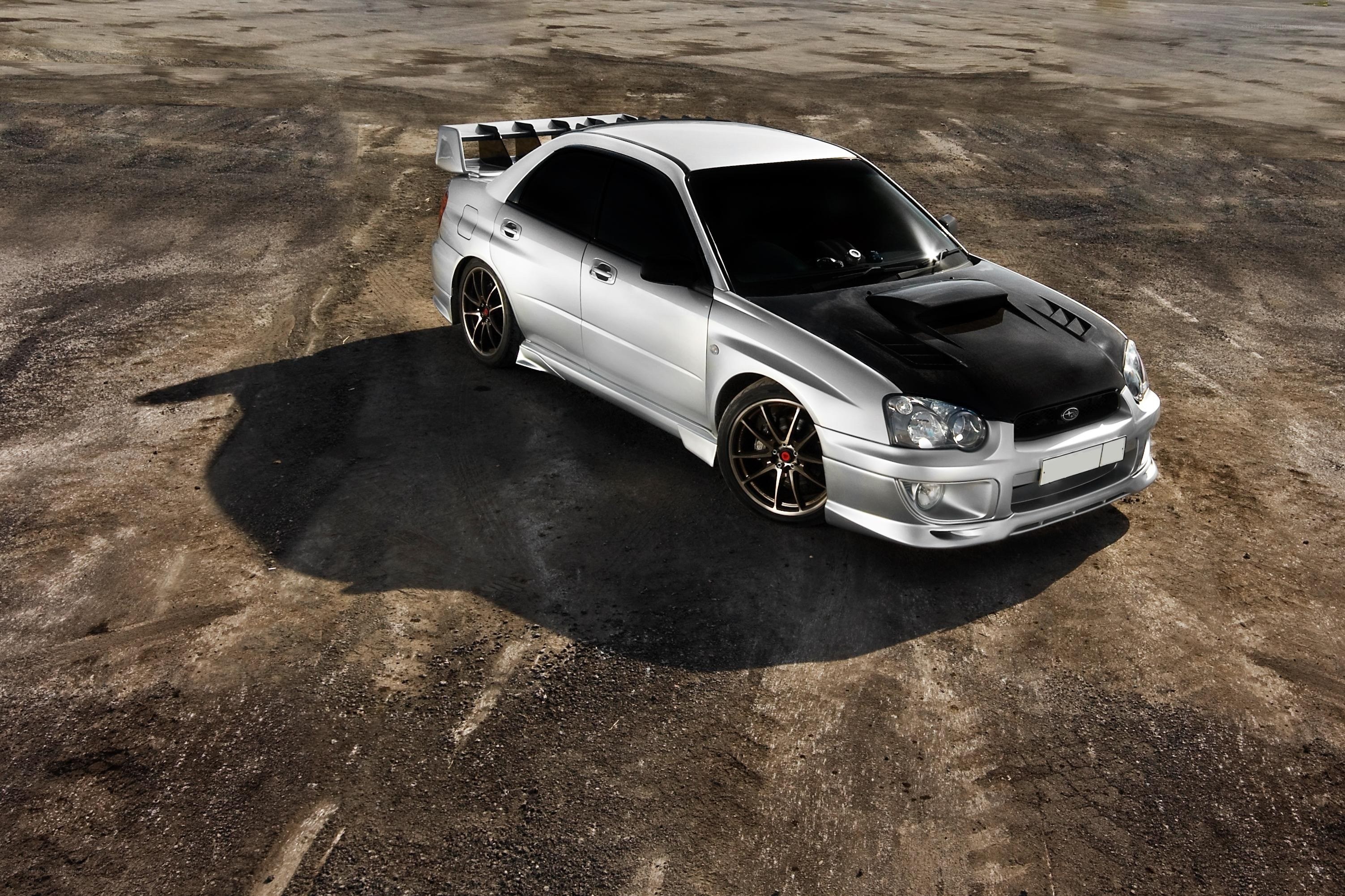 silver subaru with black hood