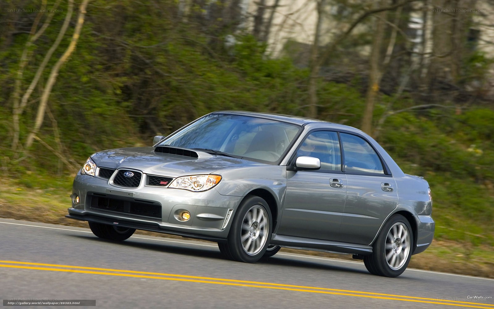 silver subaru wrx driving on road