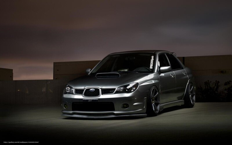 silver subaru wrx sti at night