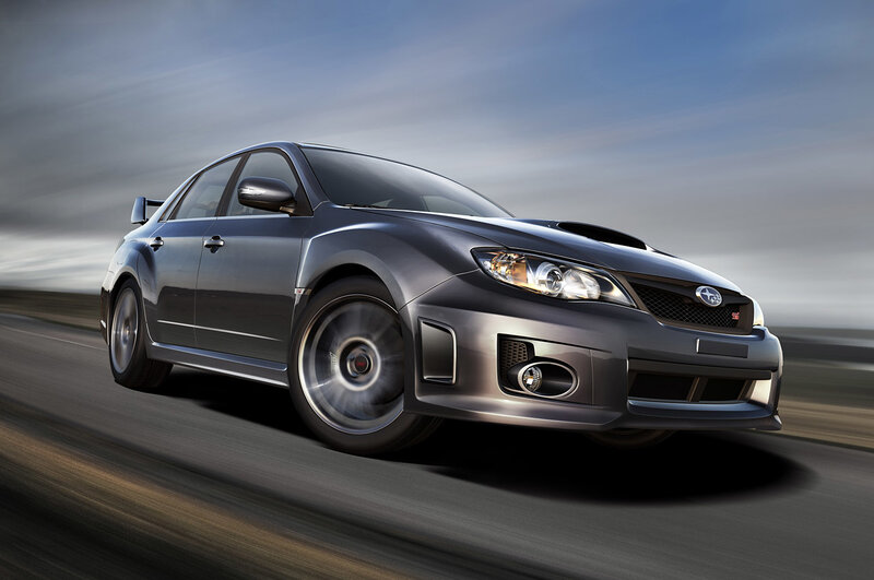 silver subaru wrx sti in motion
