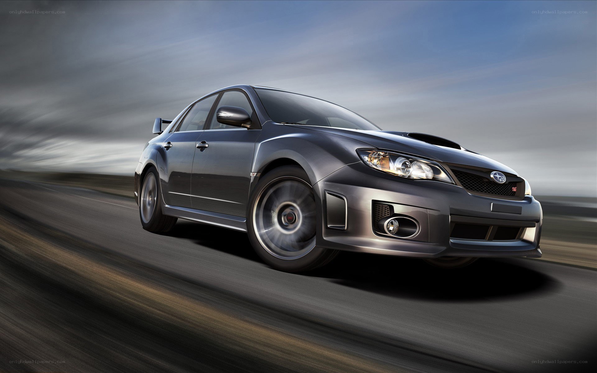 silver subaru wrx sti in motion