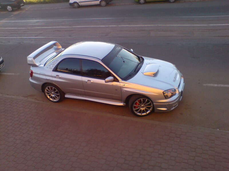 silver subaru wrx sti on street