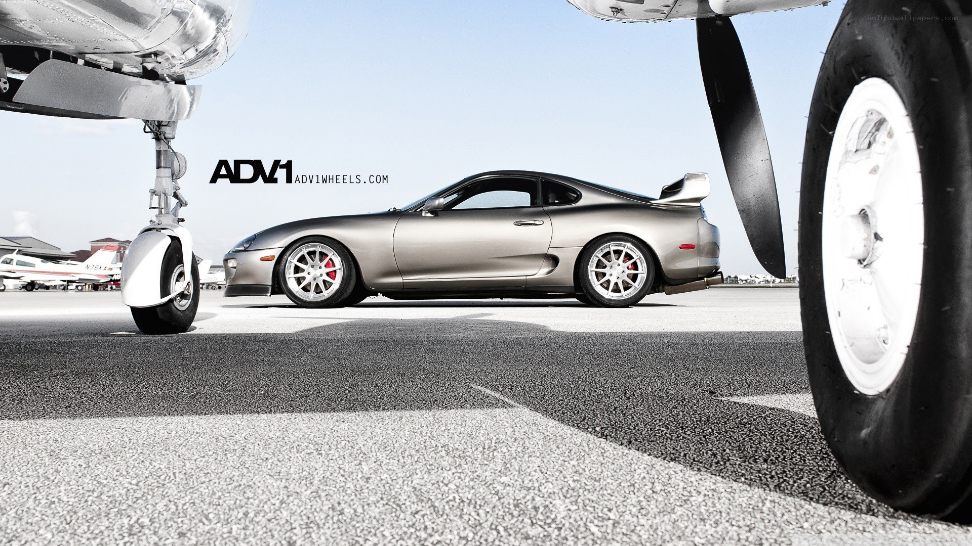 Silver Supra on tarmac