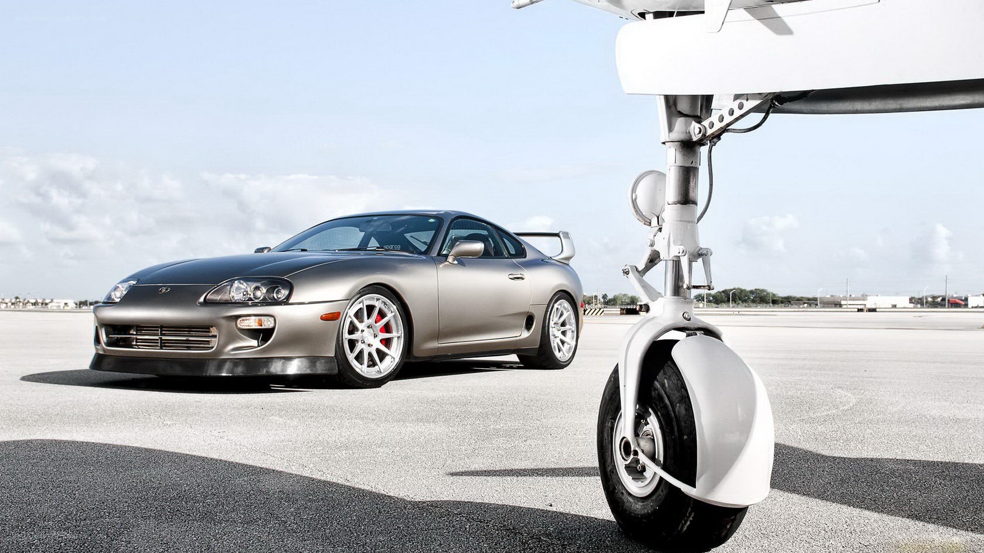 Silver Supra on tarmac