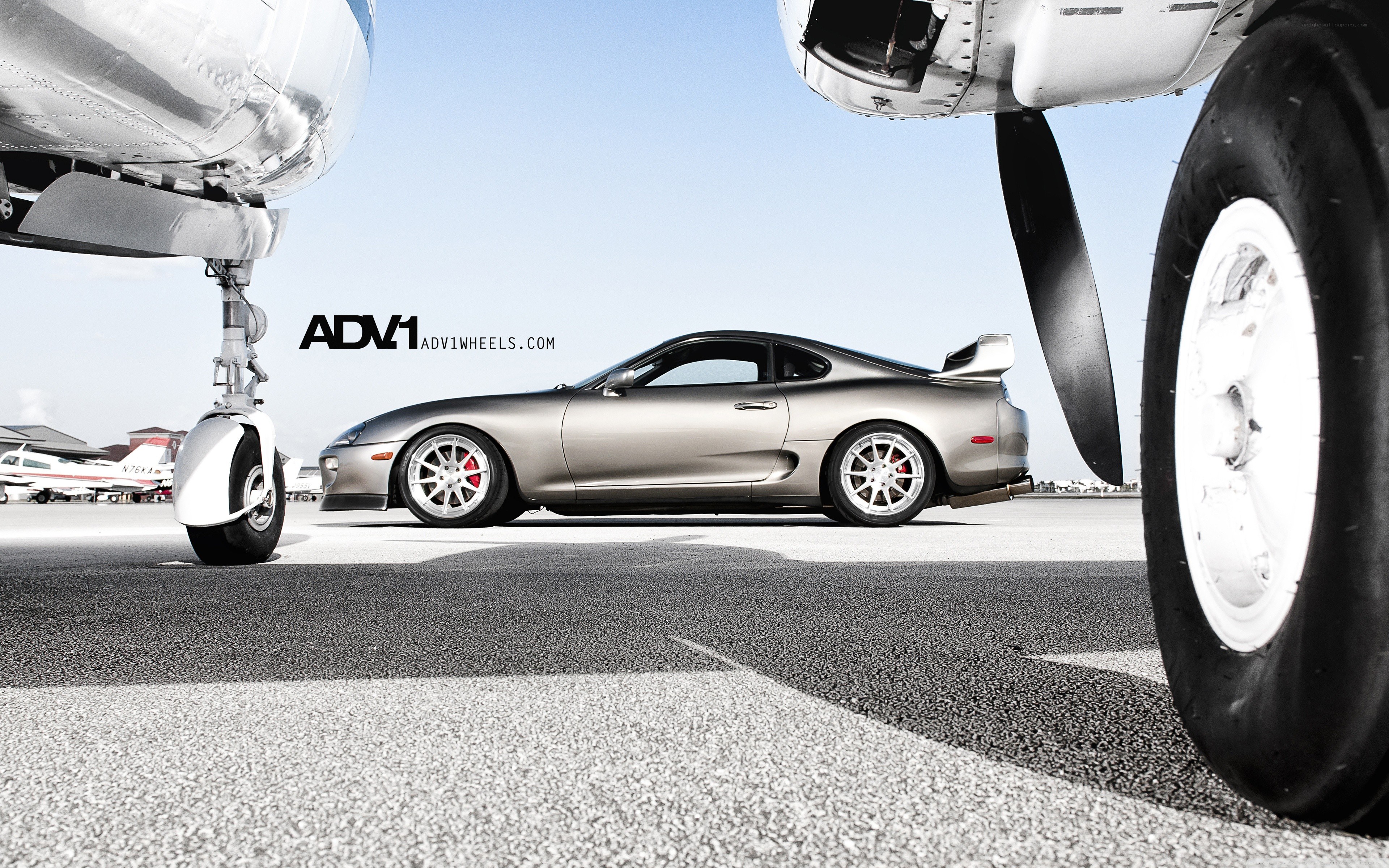 Silver Supra on tarmac