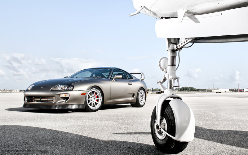 Silver Supra on tarmac