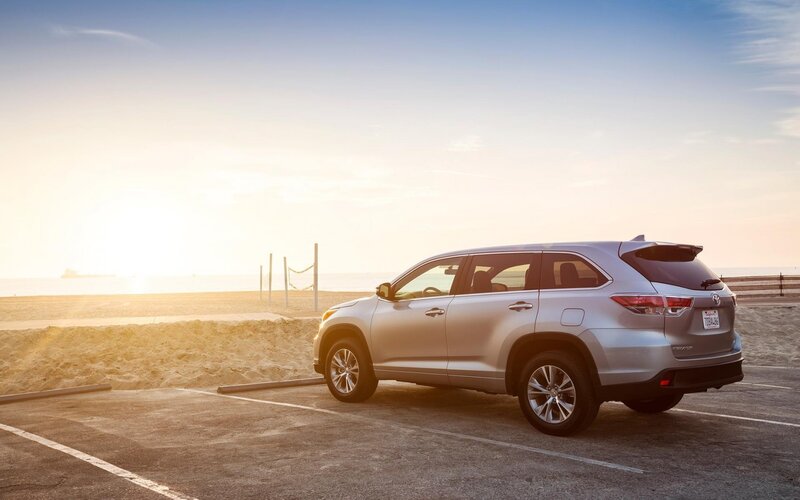 Silver SUV at beach parking