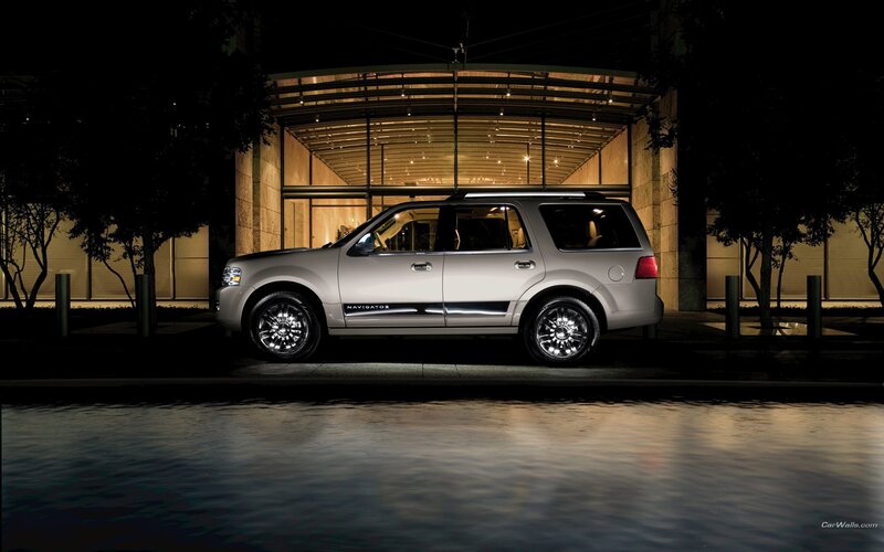 silver suv at night