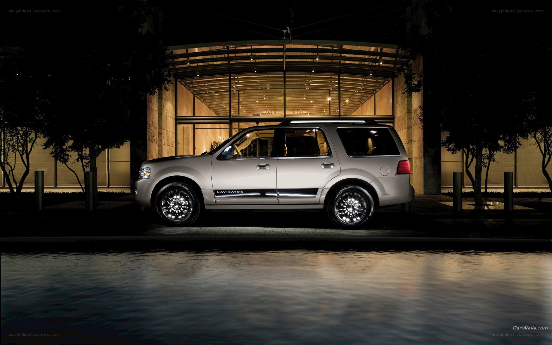 silver suv at night