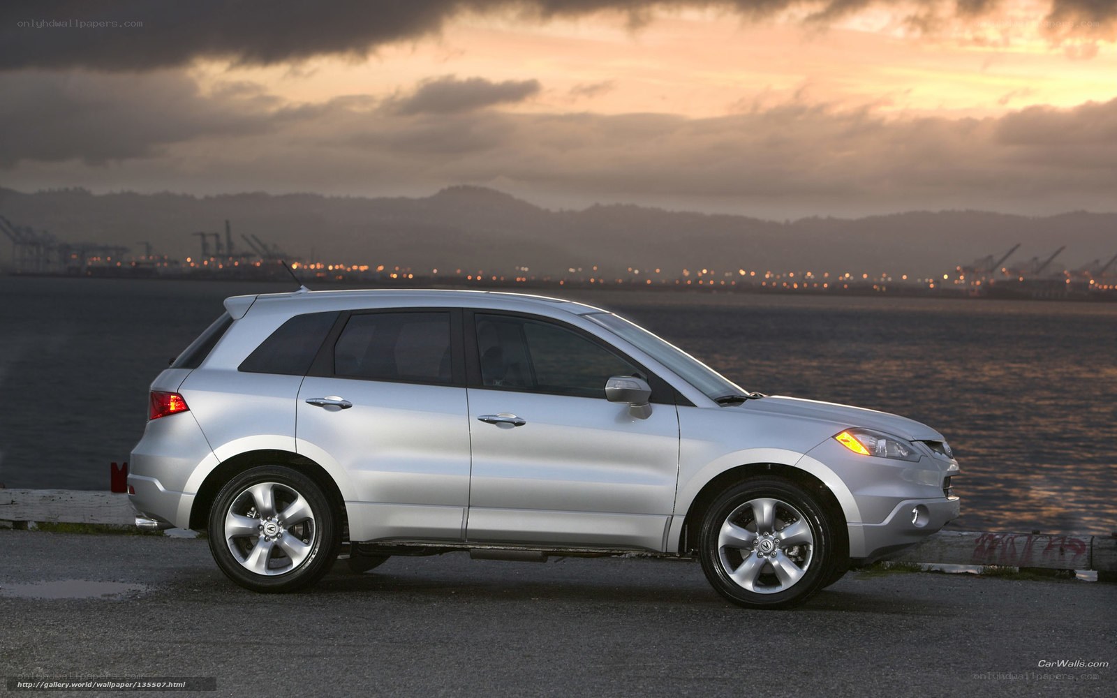 silver suv at sunset