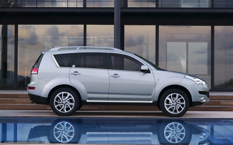 silver suv by pool