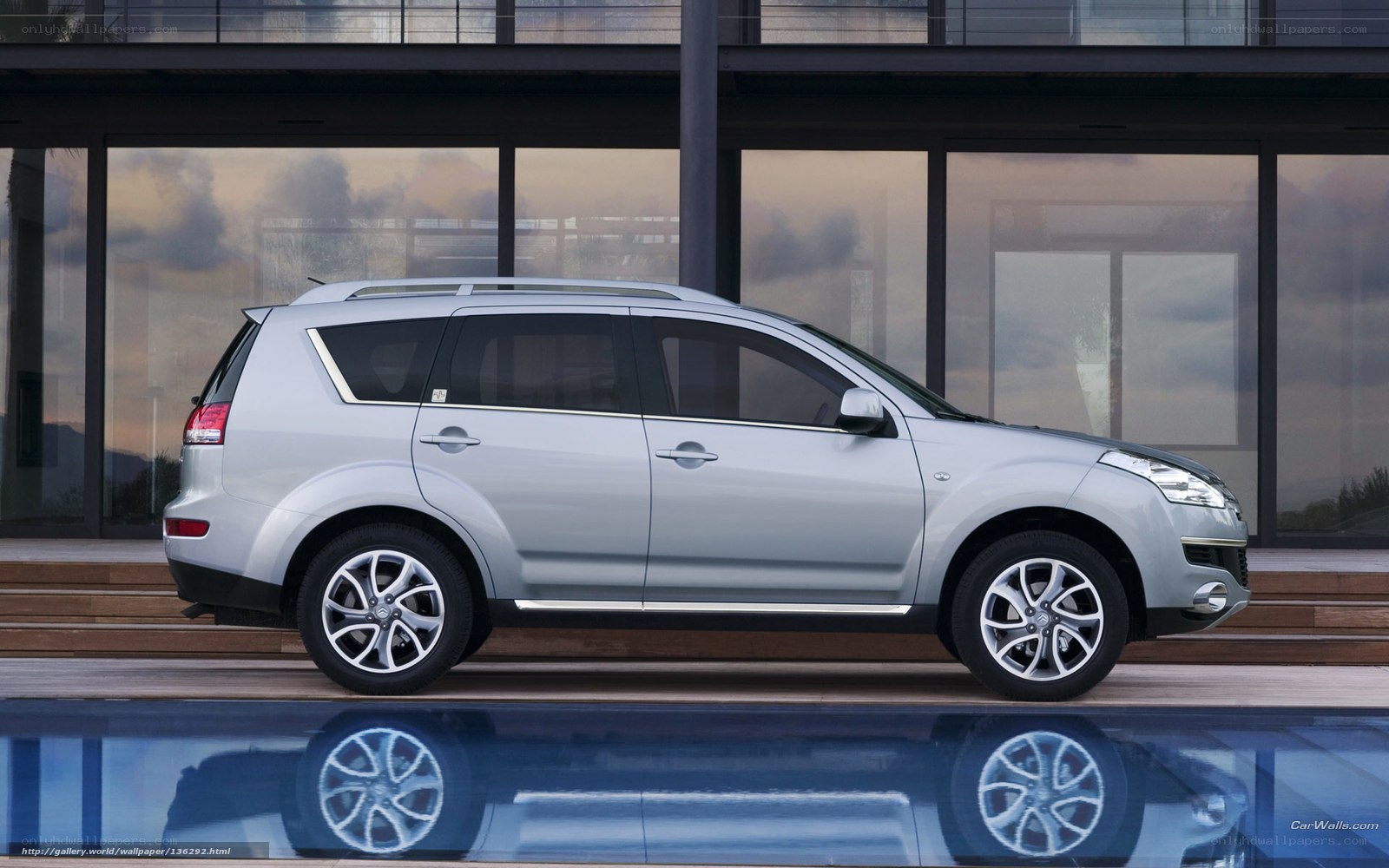 silver suv by pool