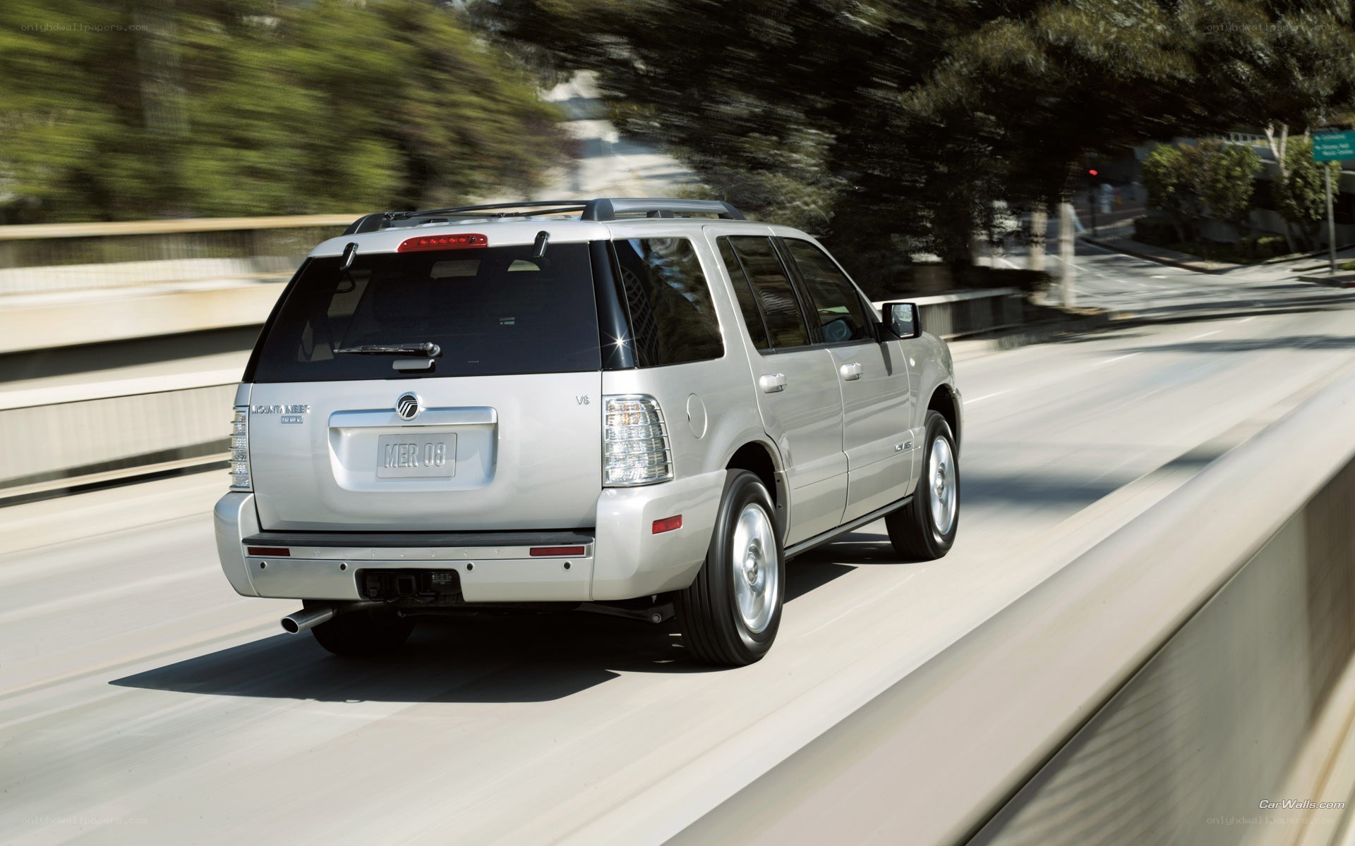 silver suv driving on highway