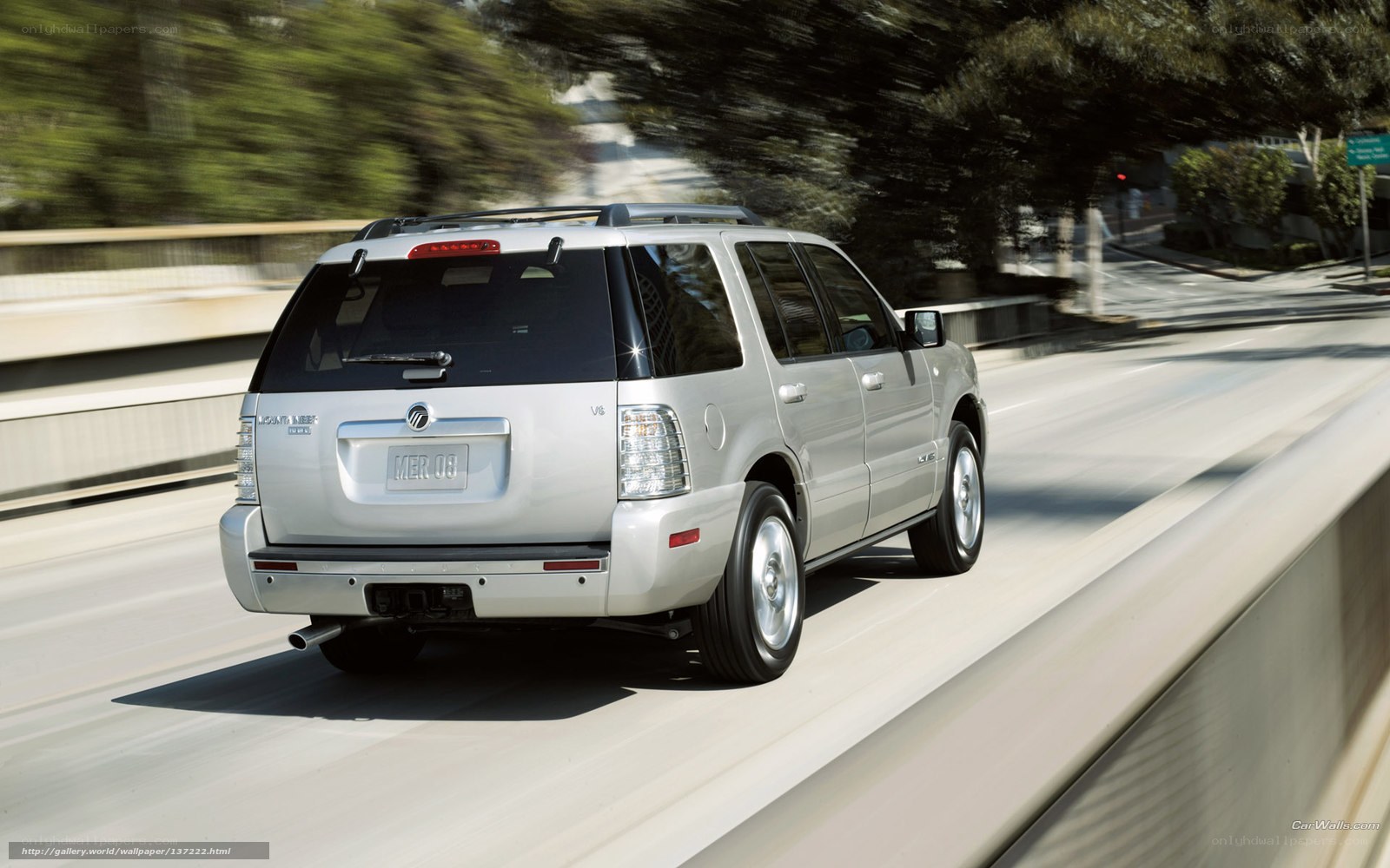 silver suv driving on highway