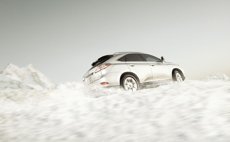 silver suv driving through snow