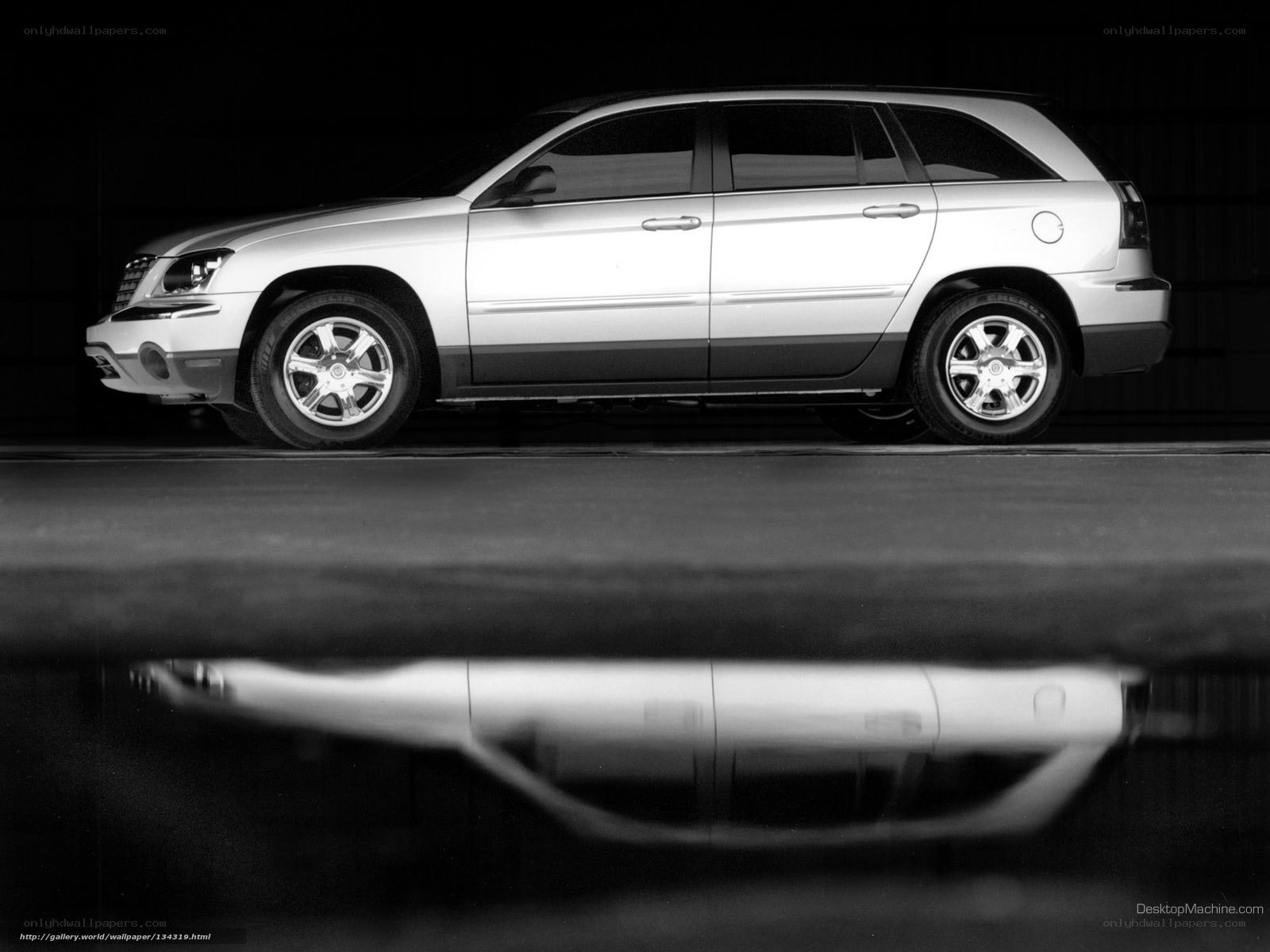 silver suv in black and white
