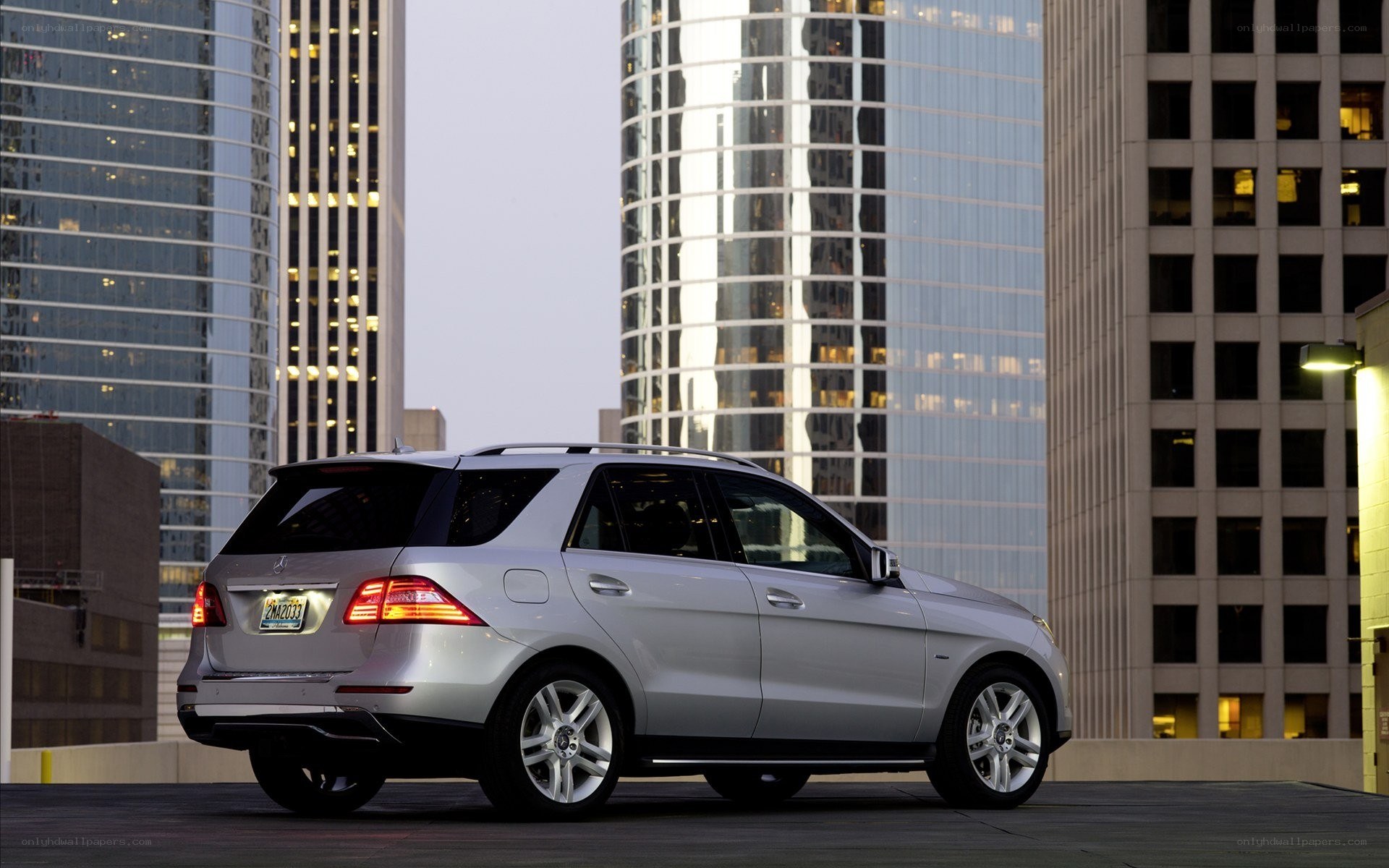 Silver SUV in city