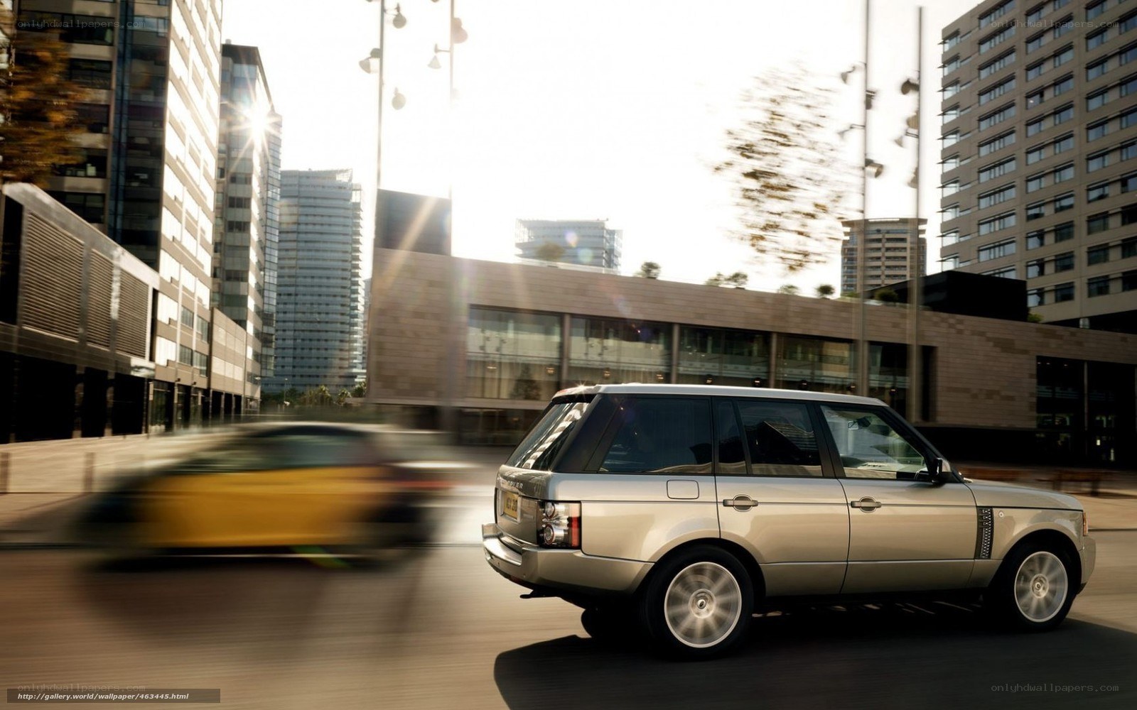 silver suv in city traffic