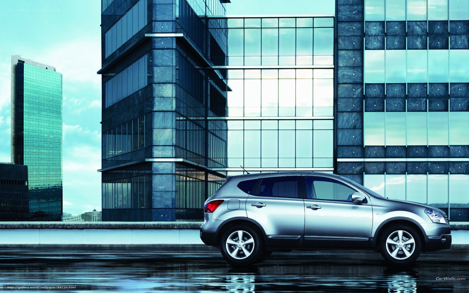 Silver SUV in cityscape