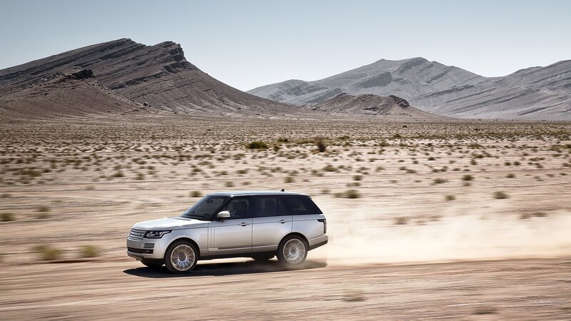 Silver SUV in Desert — Arid, Afternoon