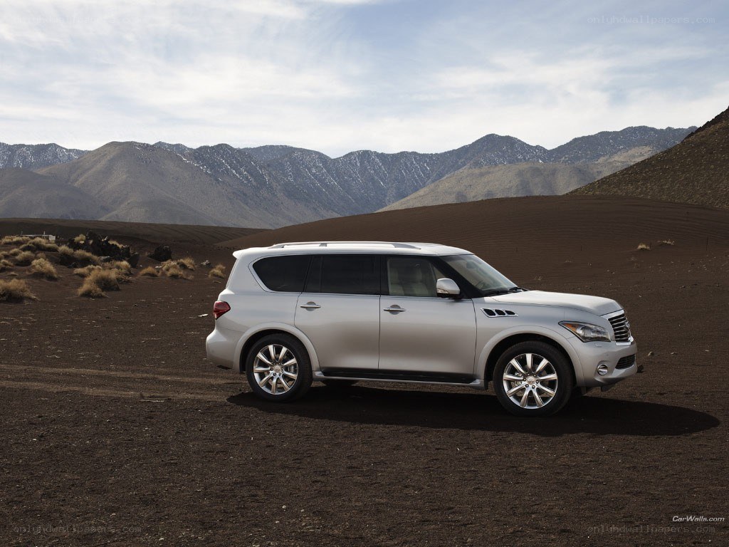 Silver SUV in desert landscape