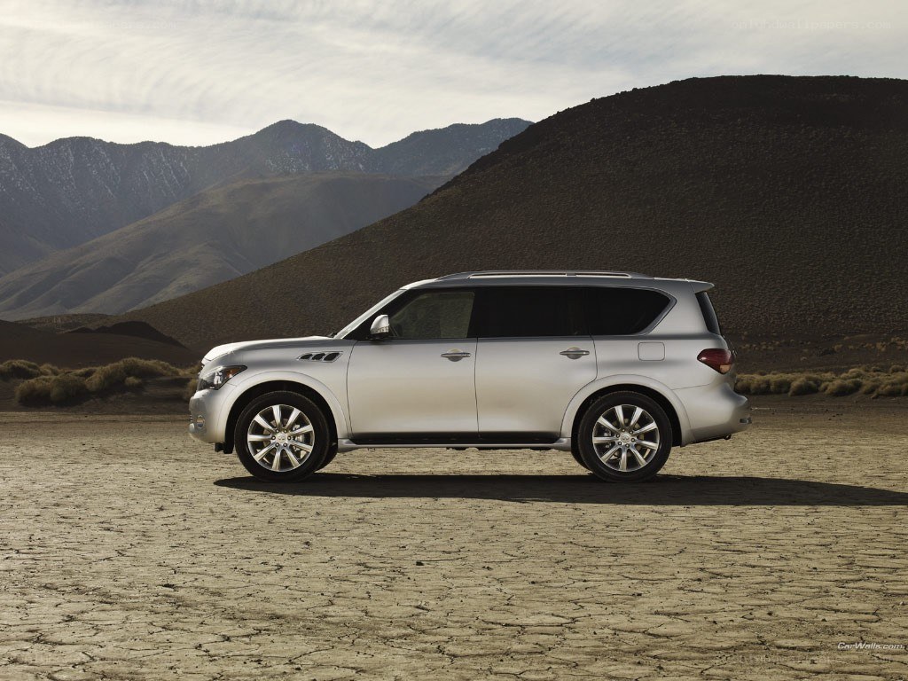 silver suv in desert landscape