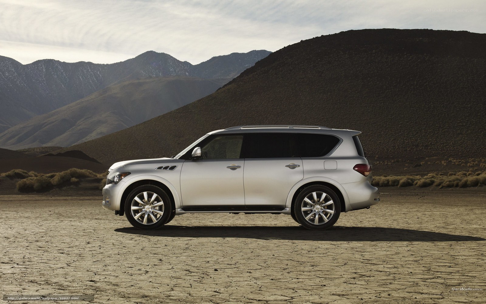 silver suv in desert landscape