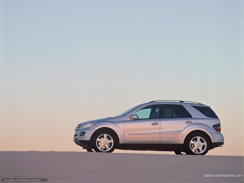 Silver SUV in Desert — Serene, Sunset