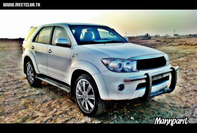 Silver Suv in Desert