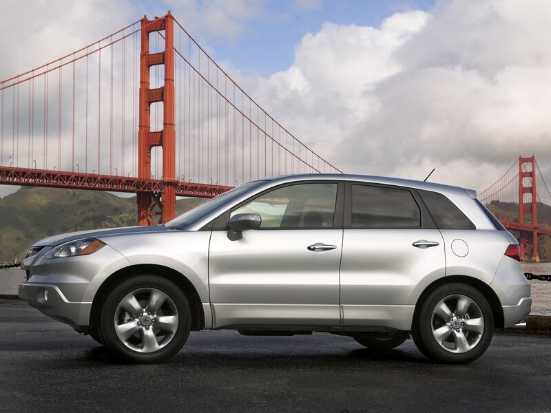 Silver SUV in front of Golden Gate Bridge