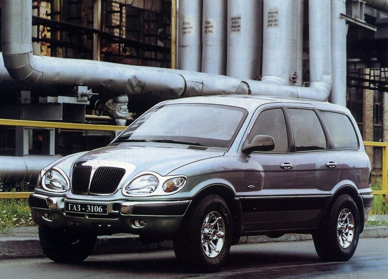 silver suv in industrial setting