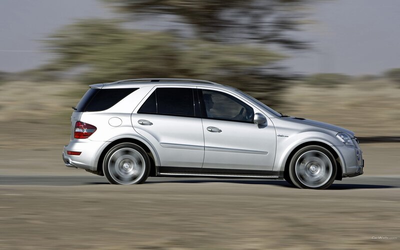 silver suv in motion