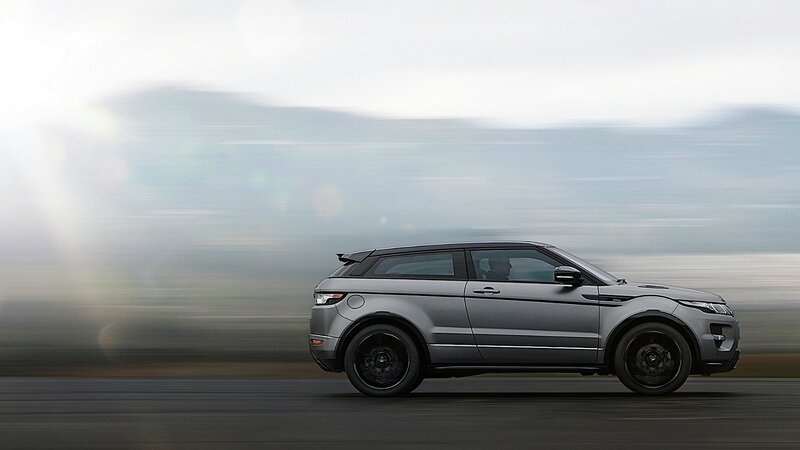 silver suv in motion