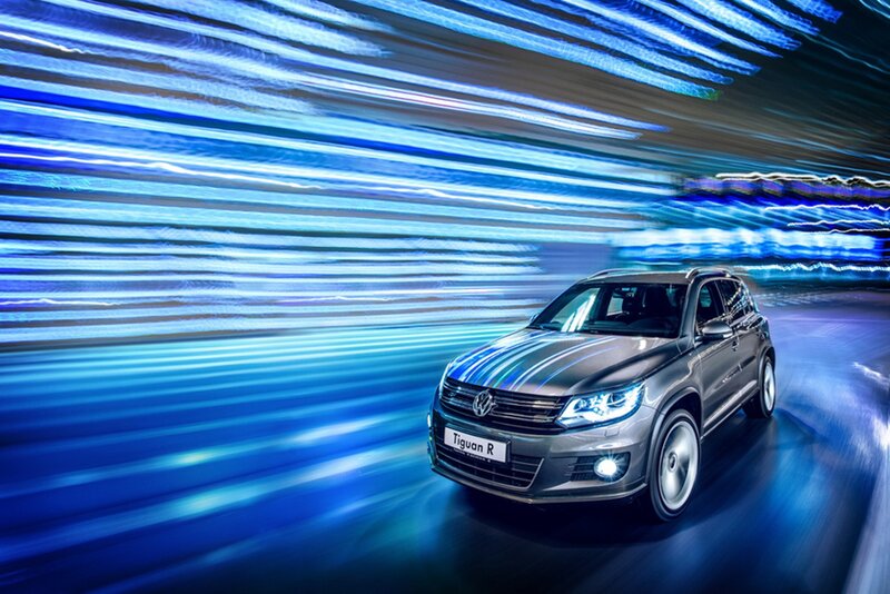 Silver SUV in Motion — Blue