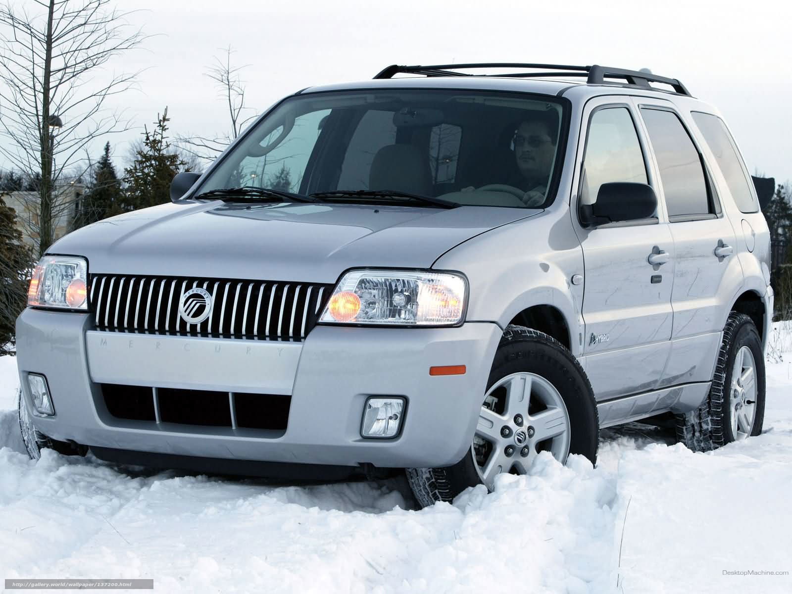 silver suv in snow