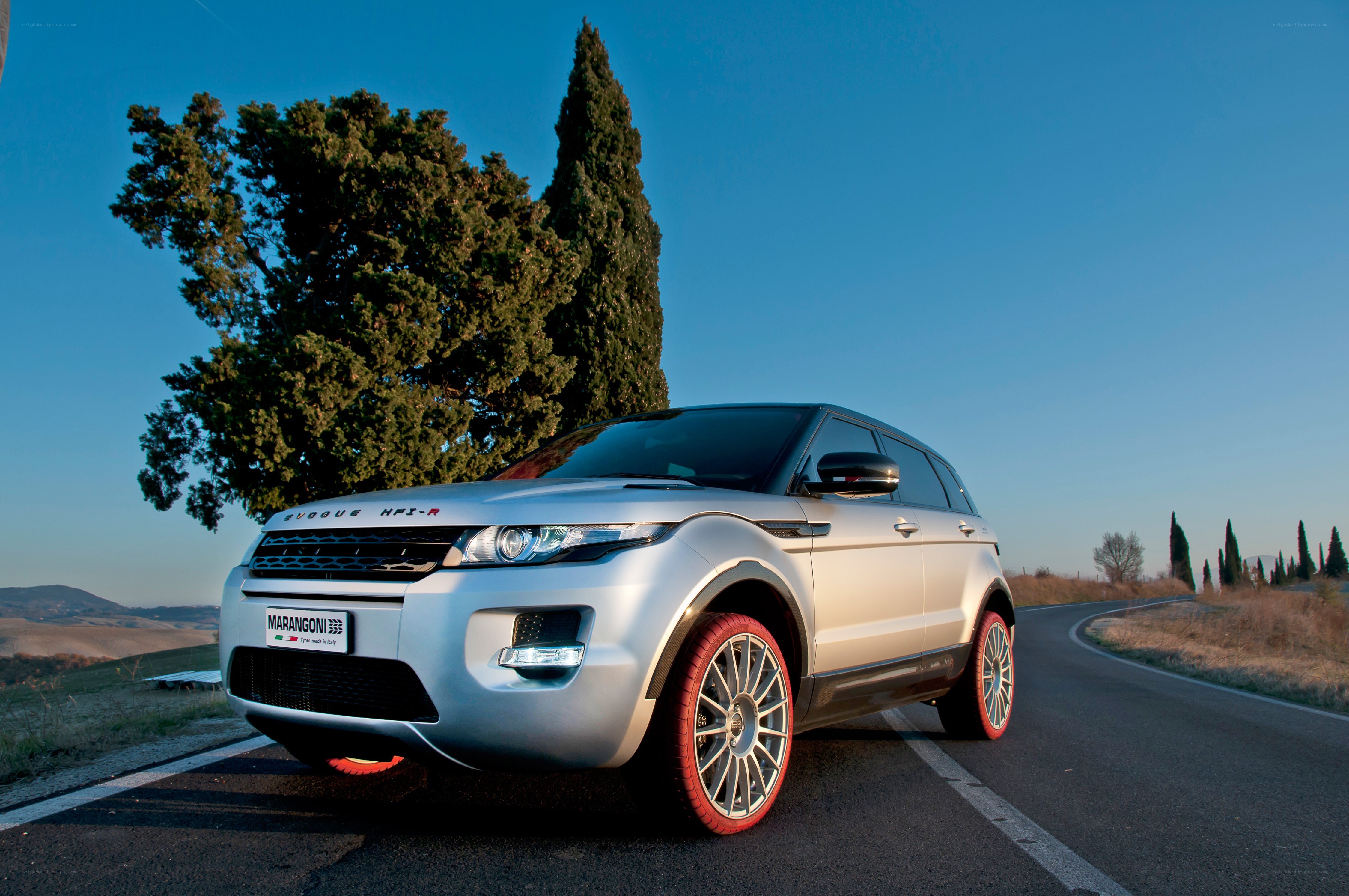 Silver SUV on a country road