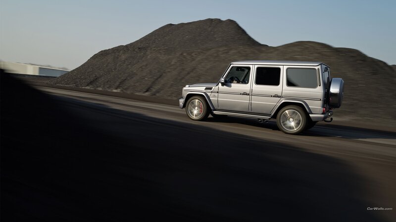 silver suv on a road