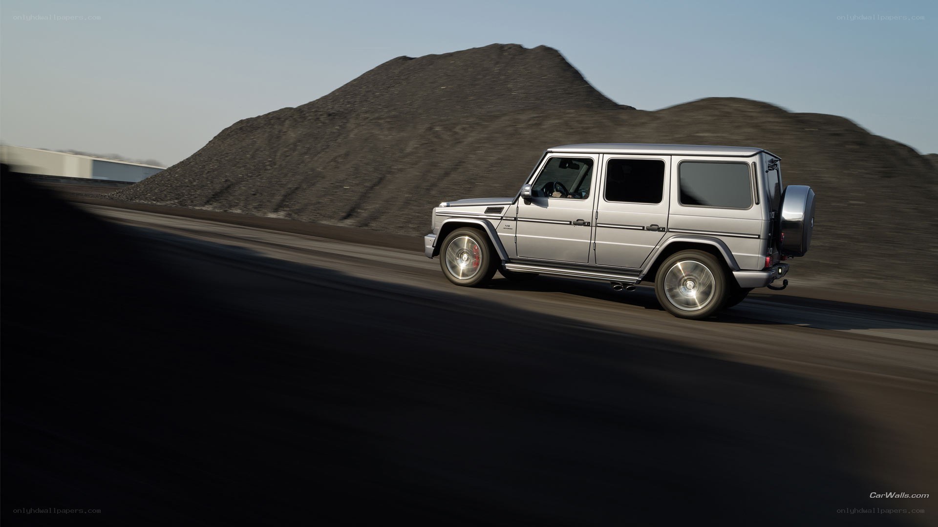silver suv on a road