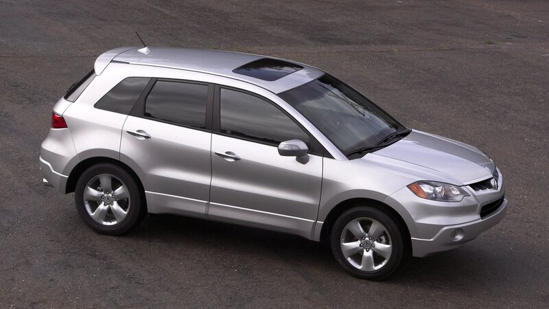 Silver Suv on Asphalt