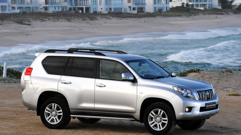 Silver SUV on beach