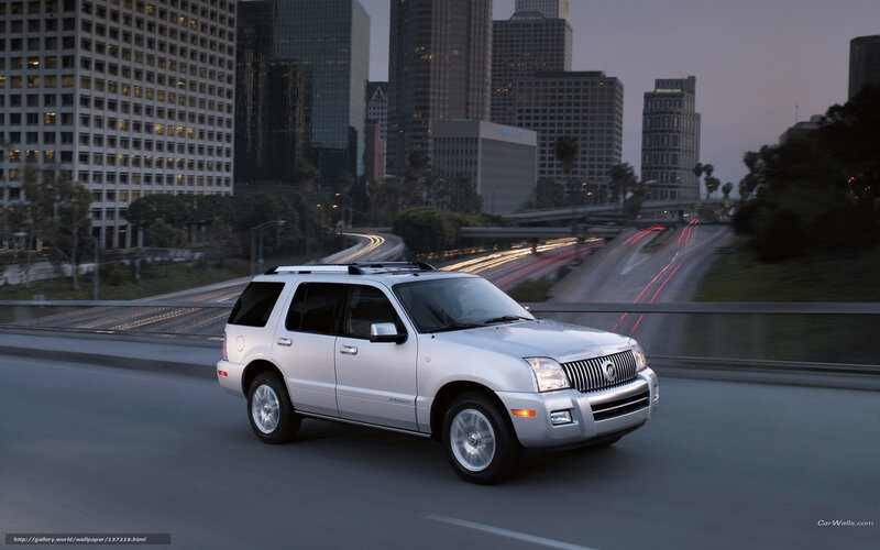 silver suv on city bridge