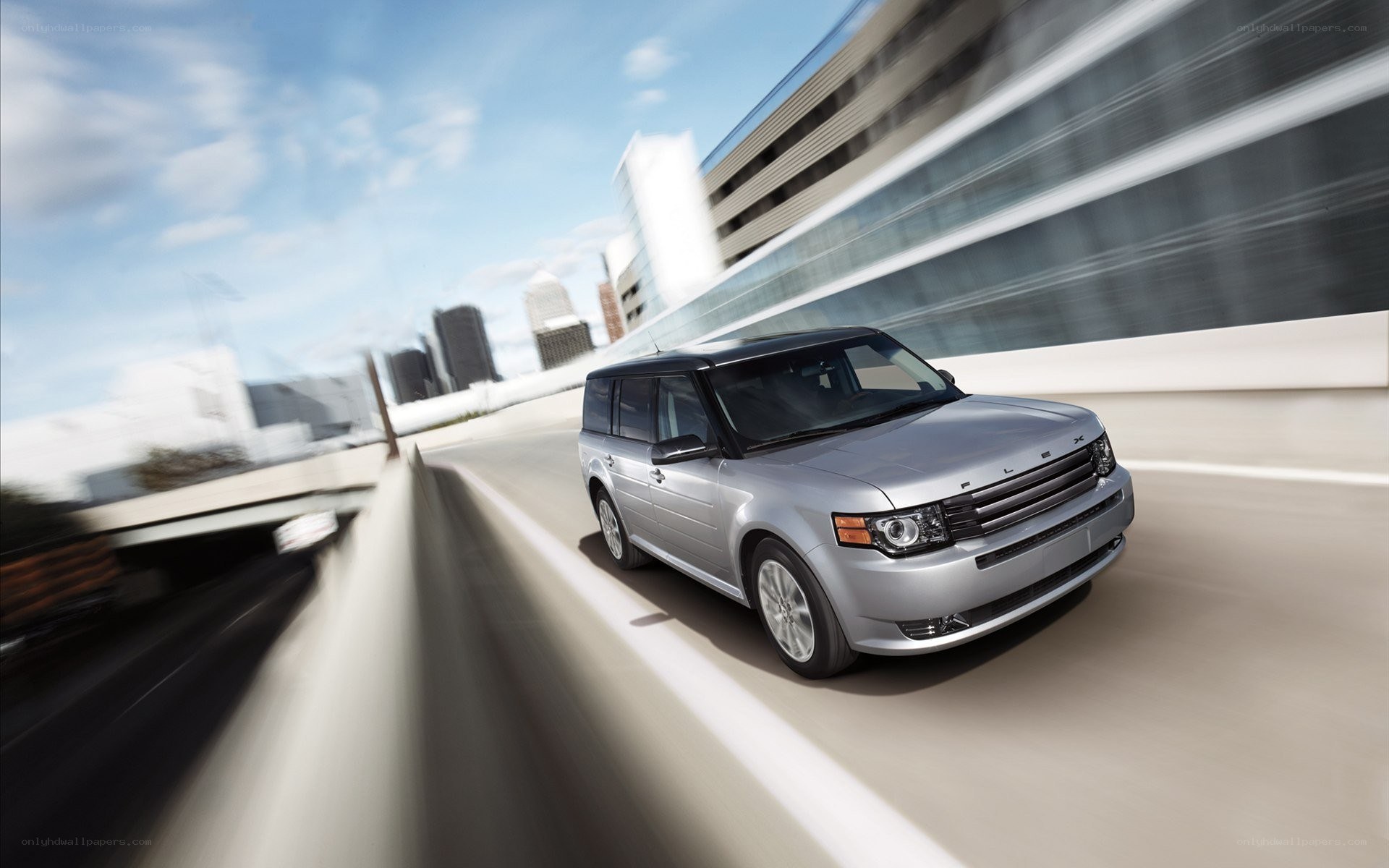Silver SUV on city highway