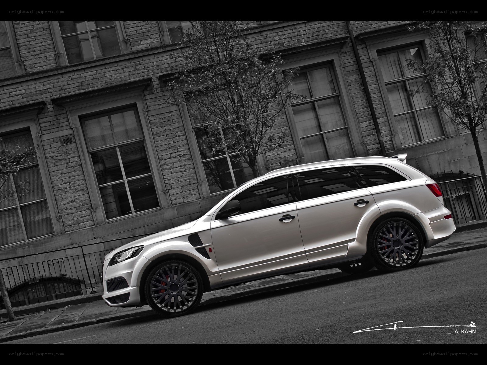 silver suv on city street
