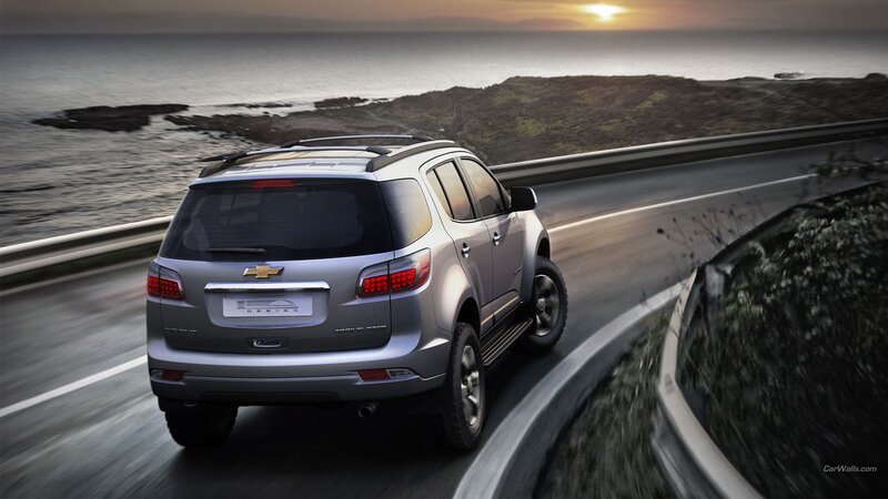 Silver Suv on Coastal Road — Gray