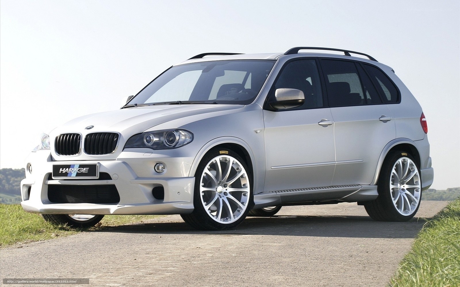 silver suv on country road