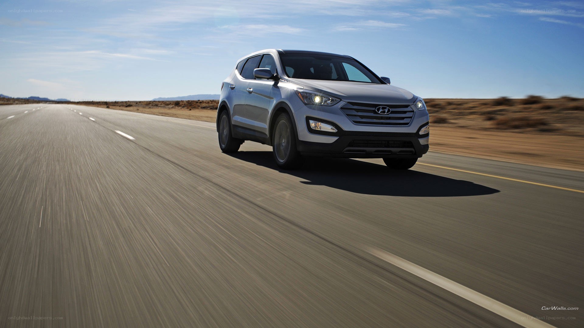 silver suv on desert highway