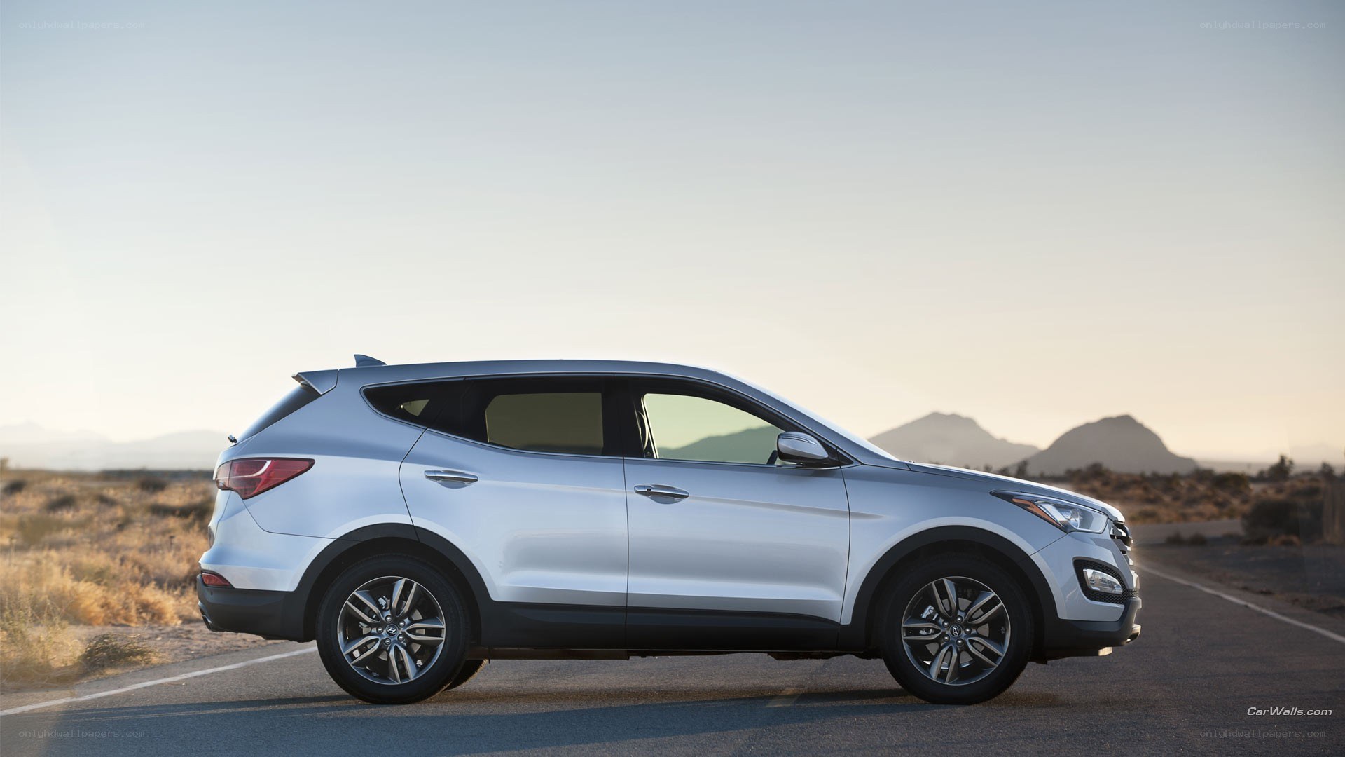 silver suv on desert road