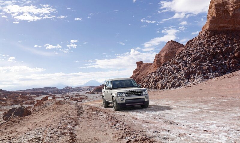 Silver Suv on Desert Road — Brown